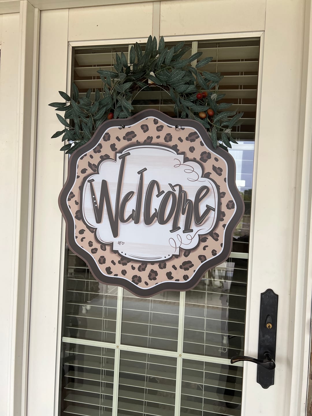 Customer photo review of Leopard Cheetah Welcome Door Hanger