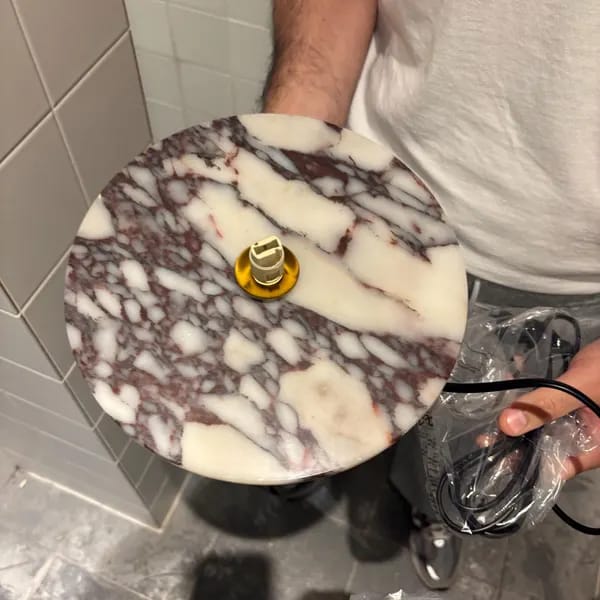 Customer photo review of Round Marble Globe Wall Sconce
