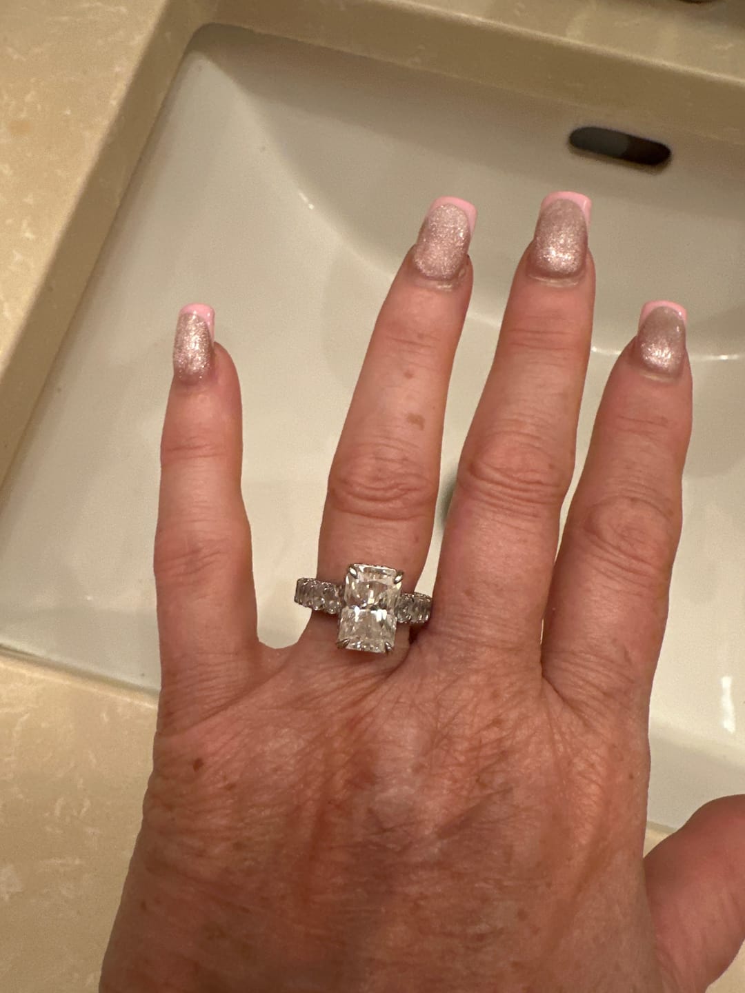 Customer photo review of 5.0ct Elongated Radiant Cut Eternity Band Engagement Ring