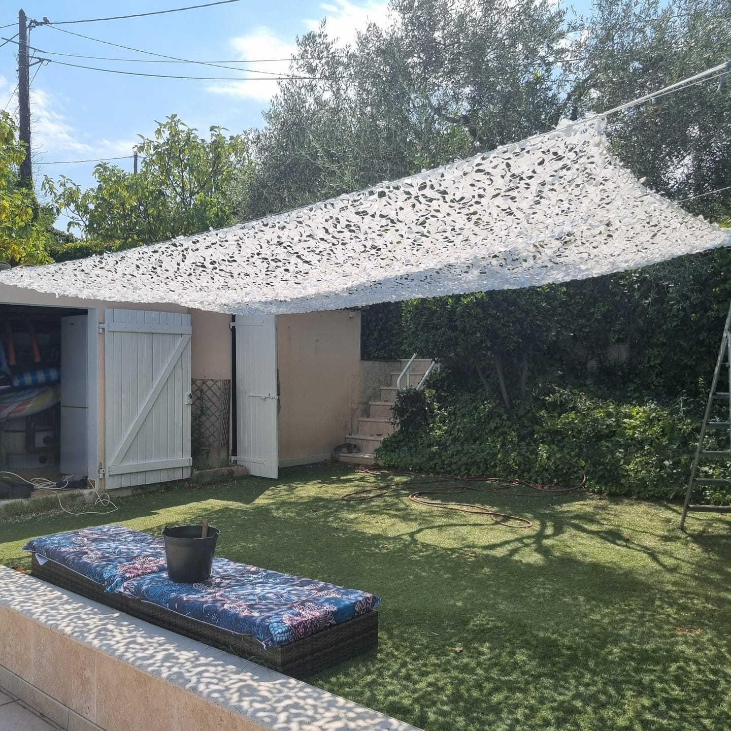 Customer photo review of Voile d'ombrage camouflage blanc