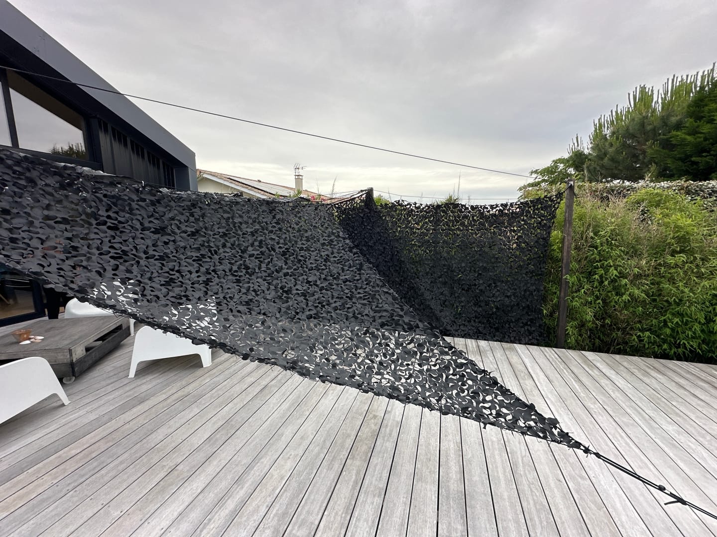 Customer photo review of Voile d'ombrage camouflage triangulaire noir