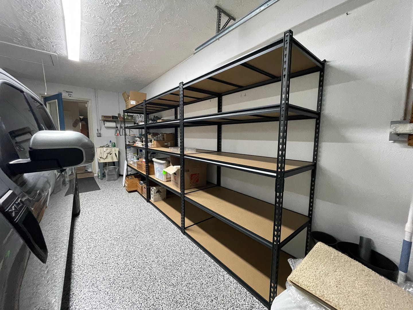 Customer photo review of Reibii 48.2″ W × 24″ D Heavy Duty Garage Shelving Units Load 3000LBS, Adjustable Steel Shelves for Garage Basement Warehouse