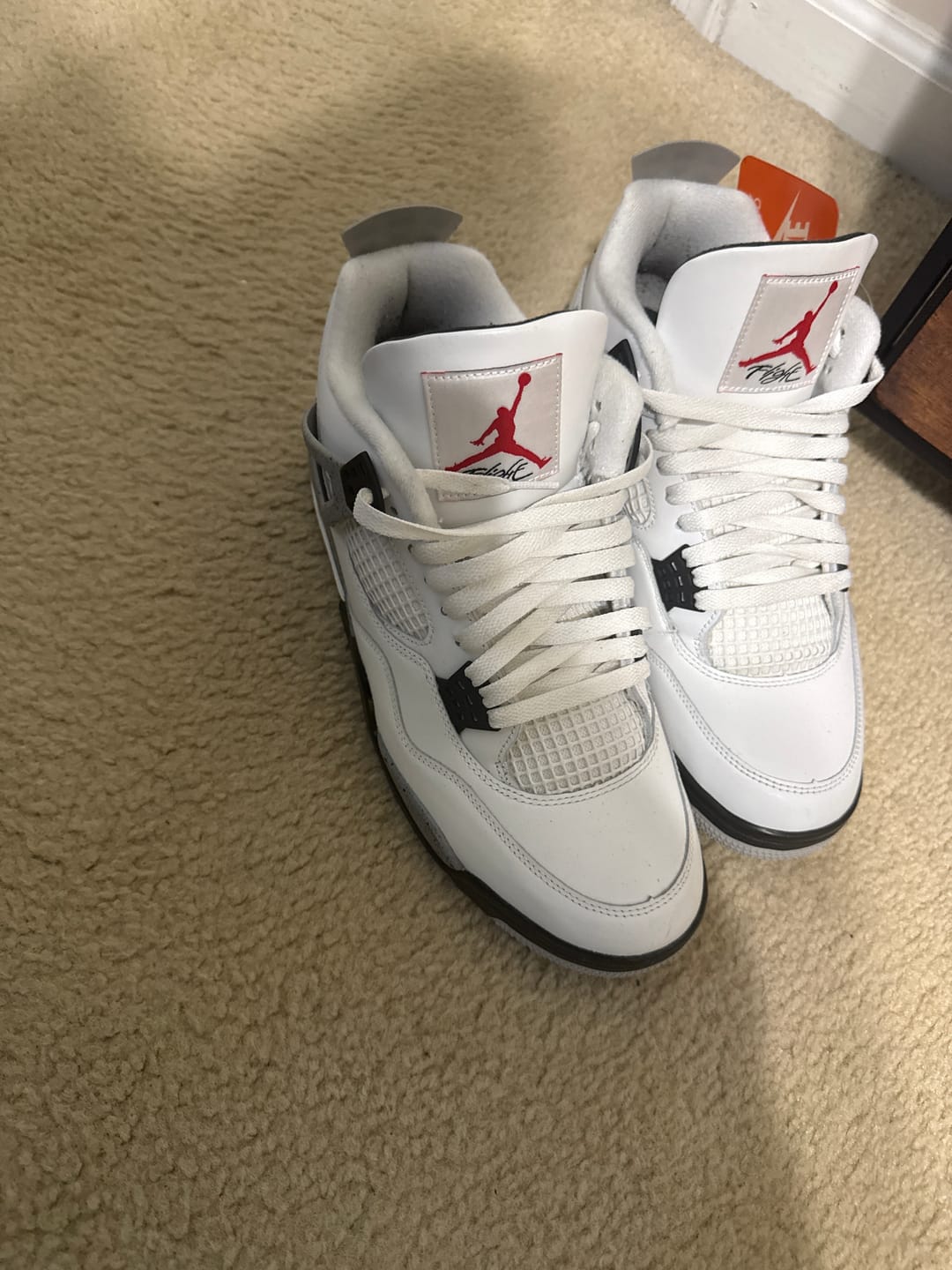 Customer photo review of Jordan 4 Retro White Cement (2025)