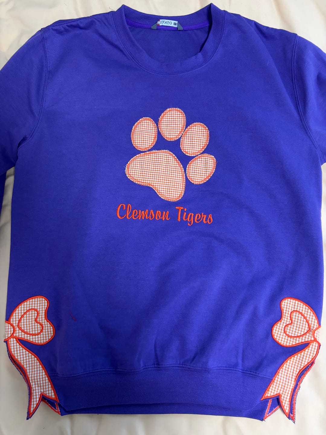 Customer photo review of Custom Tennessee Volunteers Women’s Team Spirit Sweatshirt – Applique Embroidered Side Bow Pullover