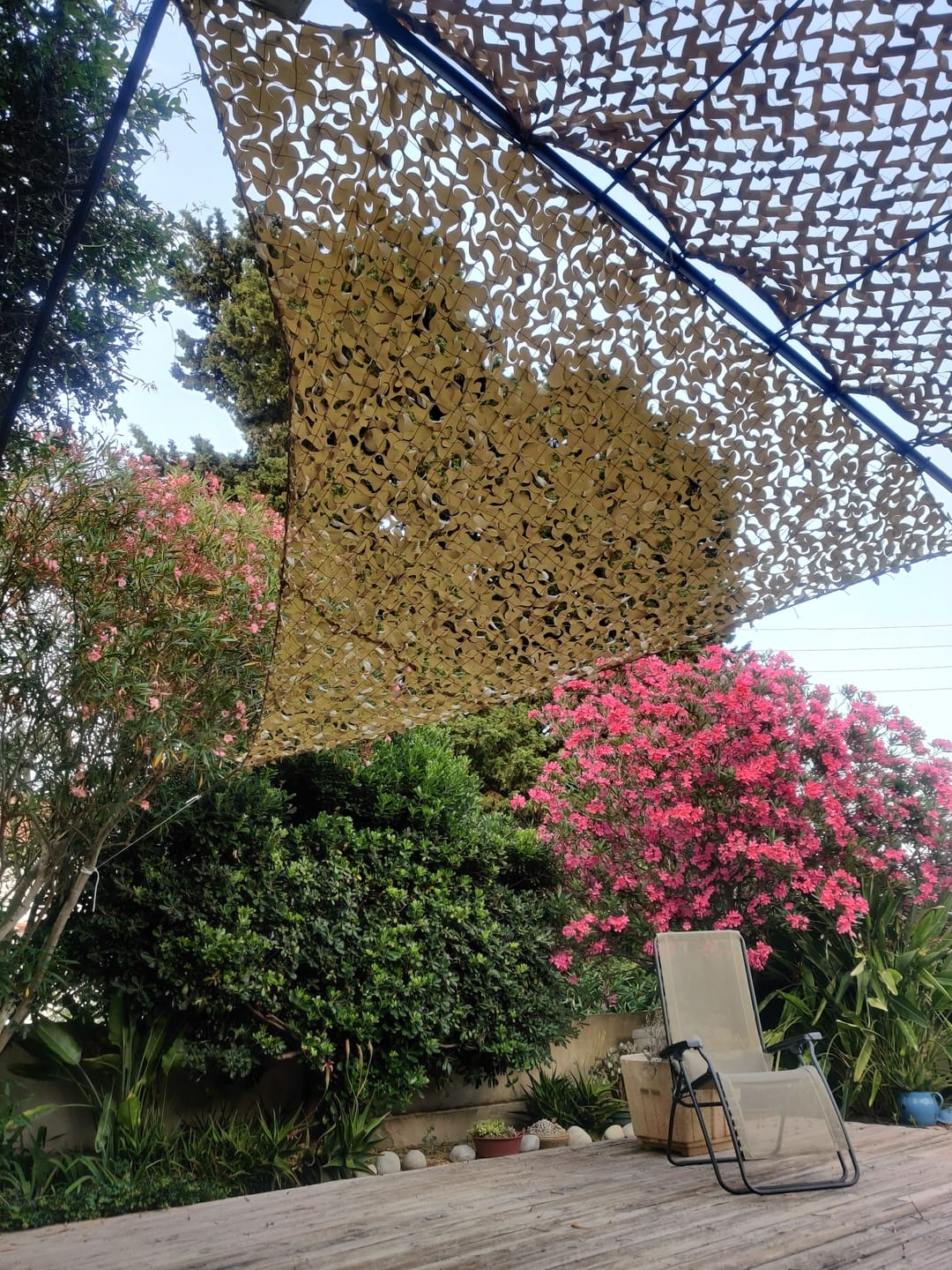Customer photo review of Voile d'ombrage camouflage triangulaire sable