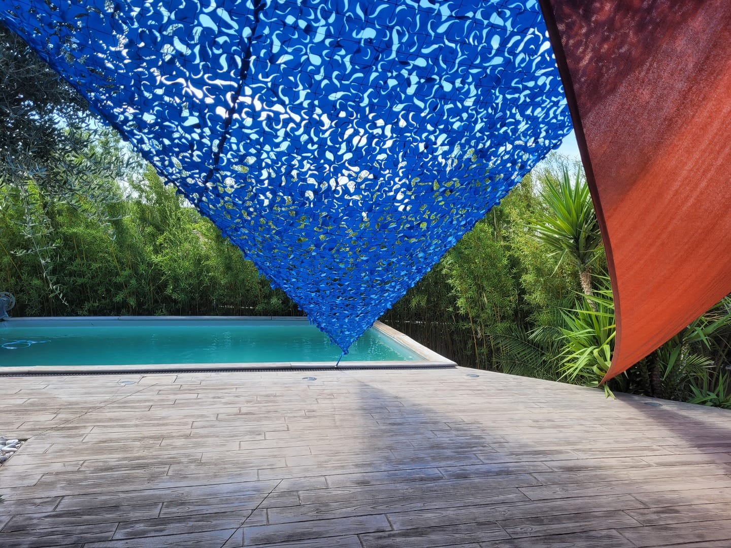 Customer photo review of Voile d'ombrage camouflage triangulaire bleu