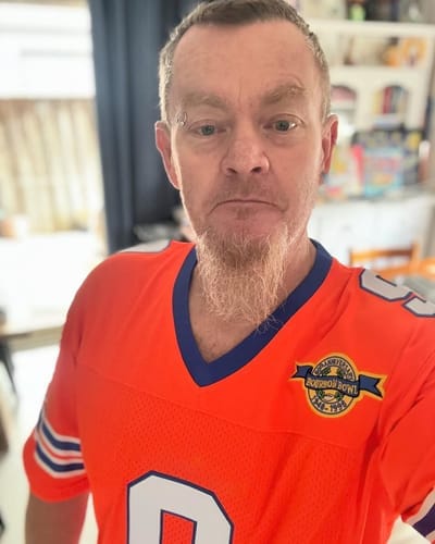 Customer photo review of Custom Orange Mesh Authentic Football Jersey with Royal and White Lettering Design 0140