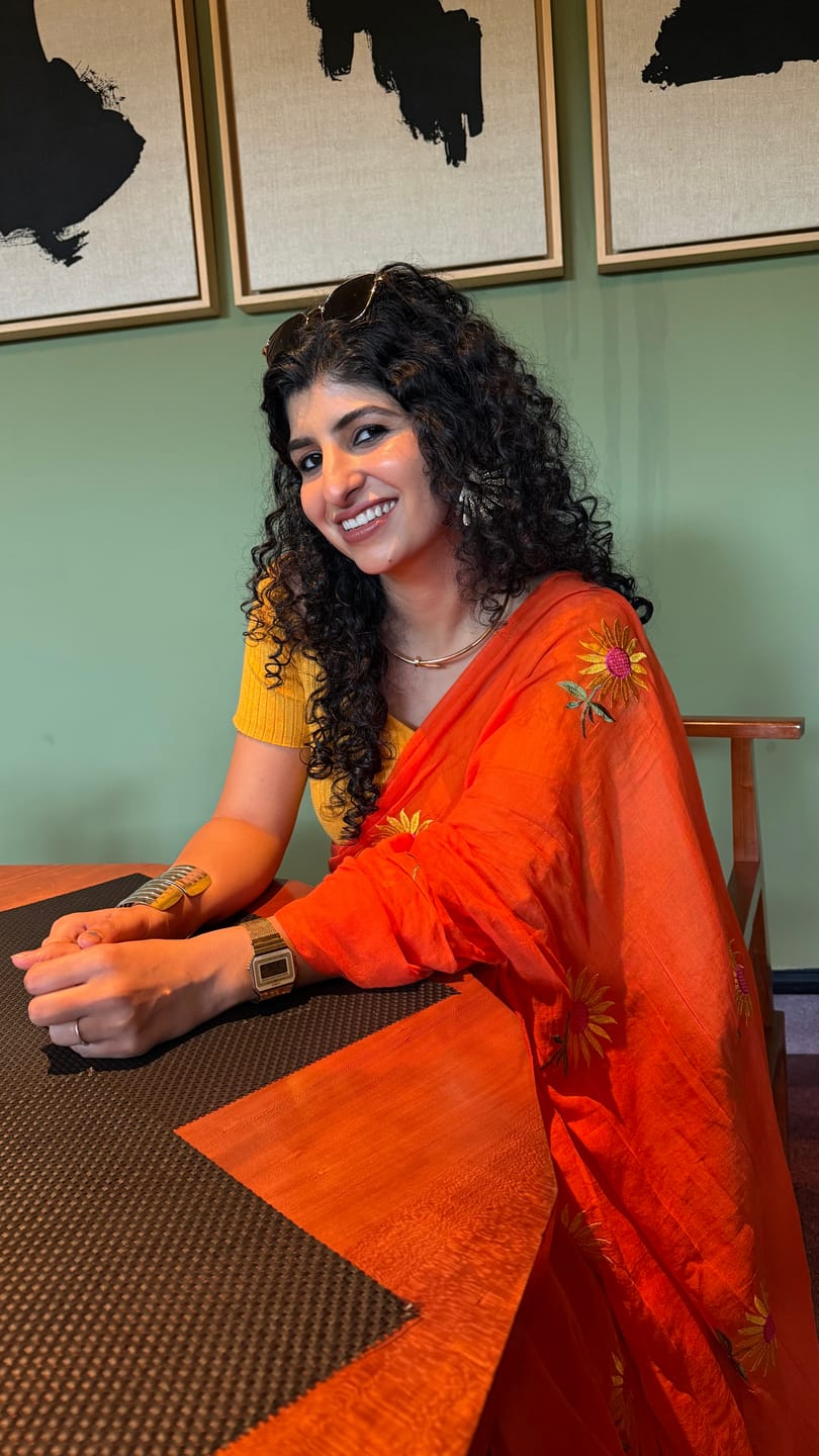 Customer photo review of Orange Sunflower Mulmul Cotton Saree