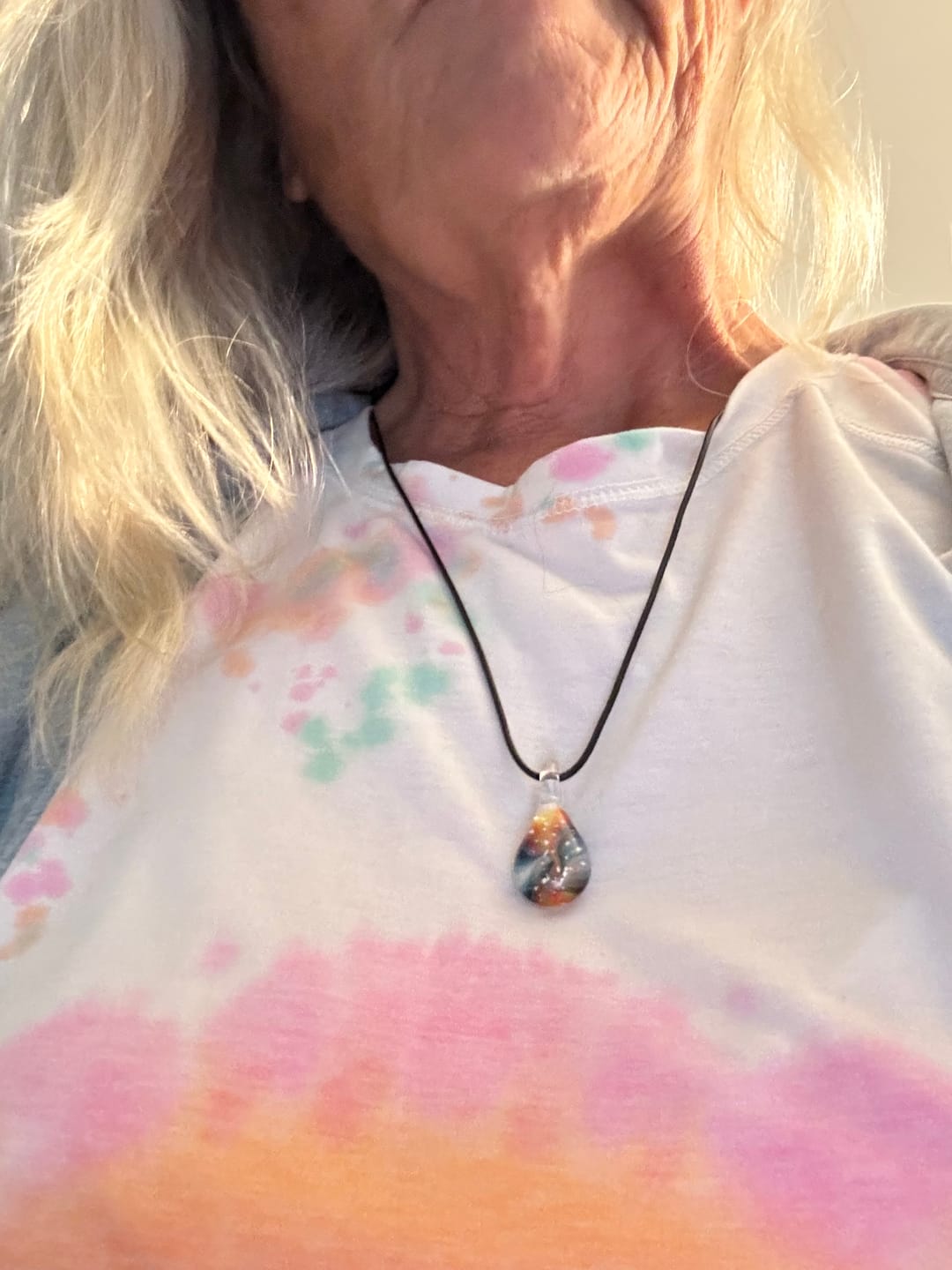 Customer photo review of Tie Dye Pendant with Infused Cremation Ashes