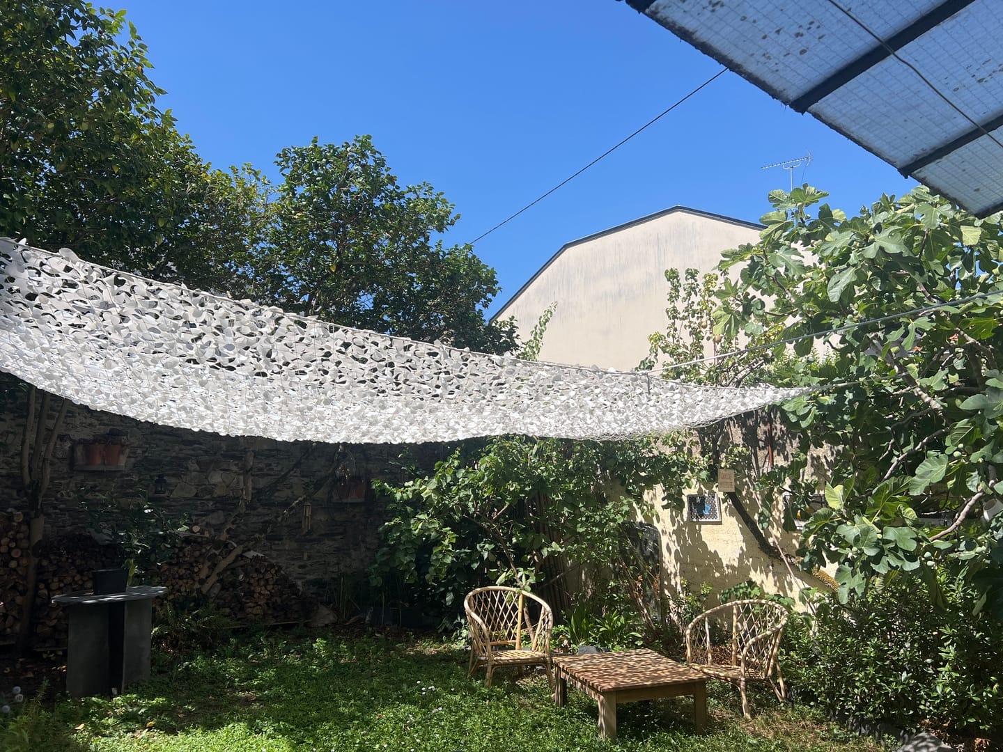 Customer photo review of Voile d'ombrage camouflage blanc