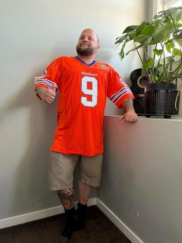 Customer photo review of Custom Orange Mesh Authentic Football Jersey with Royal and White Lettering Design 0140