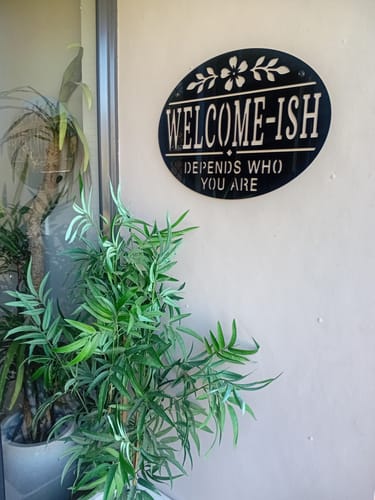 Customer photo review of Welcome-ish Funny Wall Art