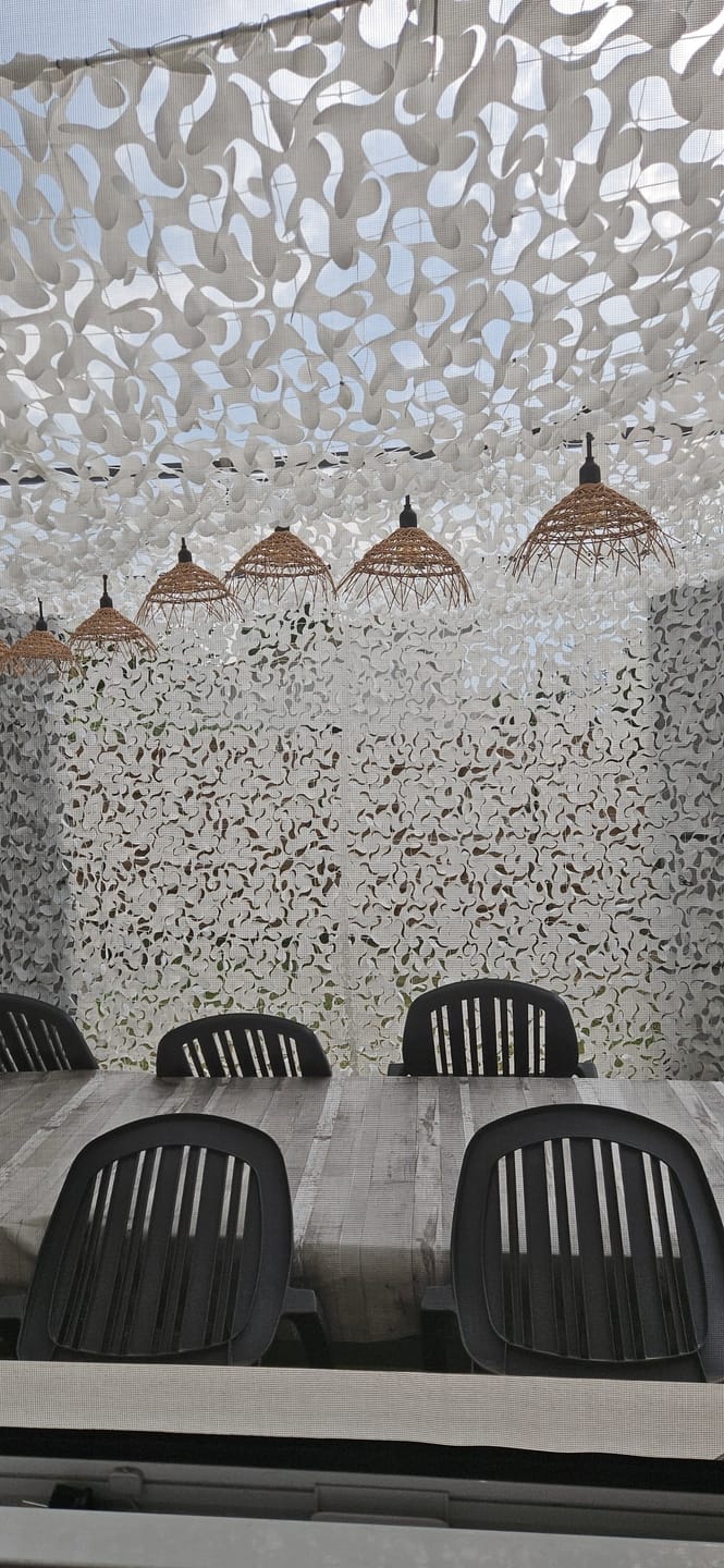 Customer photo review of Voile d'ombrage camouflage blanc