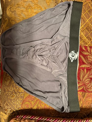 Customer's gray Bamboo Briefs with a black, branded waistband showing the V-Fly opening.