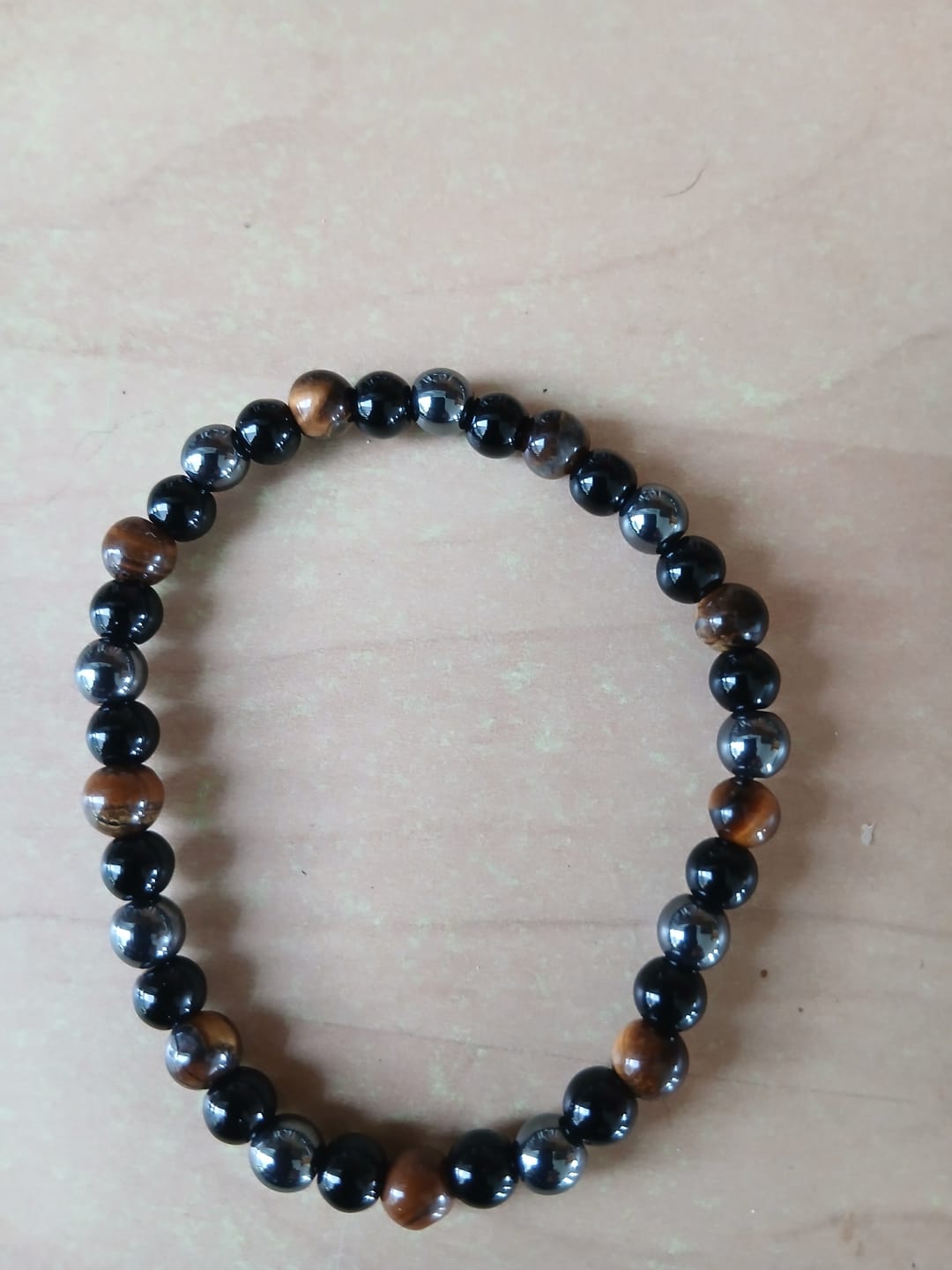 Customer photo review of Bracelet "Triple Protection" en Hématite, Oeil de Tigre et Obsidienne