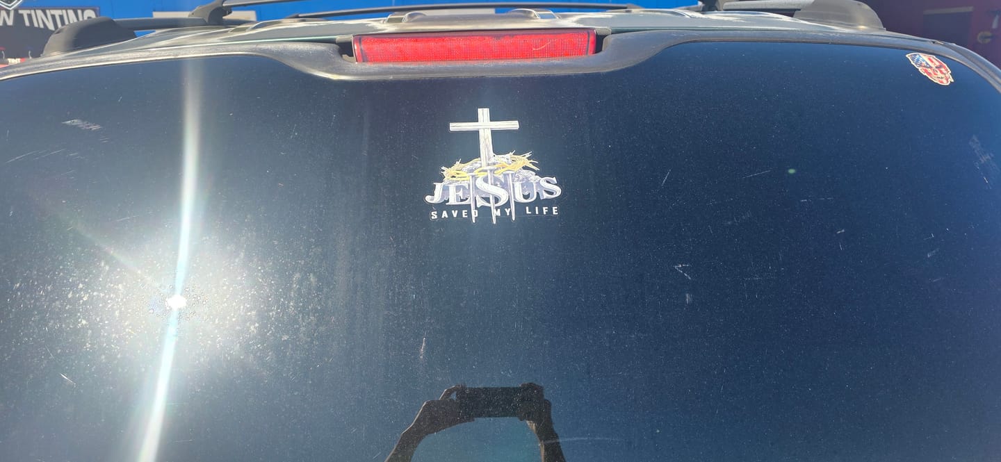 Customer photo review of Christianartworkshop Cross Crown of Thorns Nails JESUS SAVED MY LIFE Waterproof Car Sticker: A Symbol of Redemptive Sacrifice