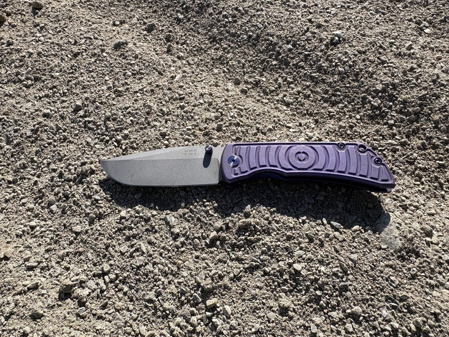 Customer photo review of The Back Door: McNees PM Mac 2 3.5" Drop Point - MagnaCut Flat Grind, Shockwave Milled Titanium, Violet and Blue - Made in USA (Trade In)