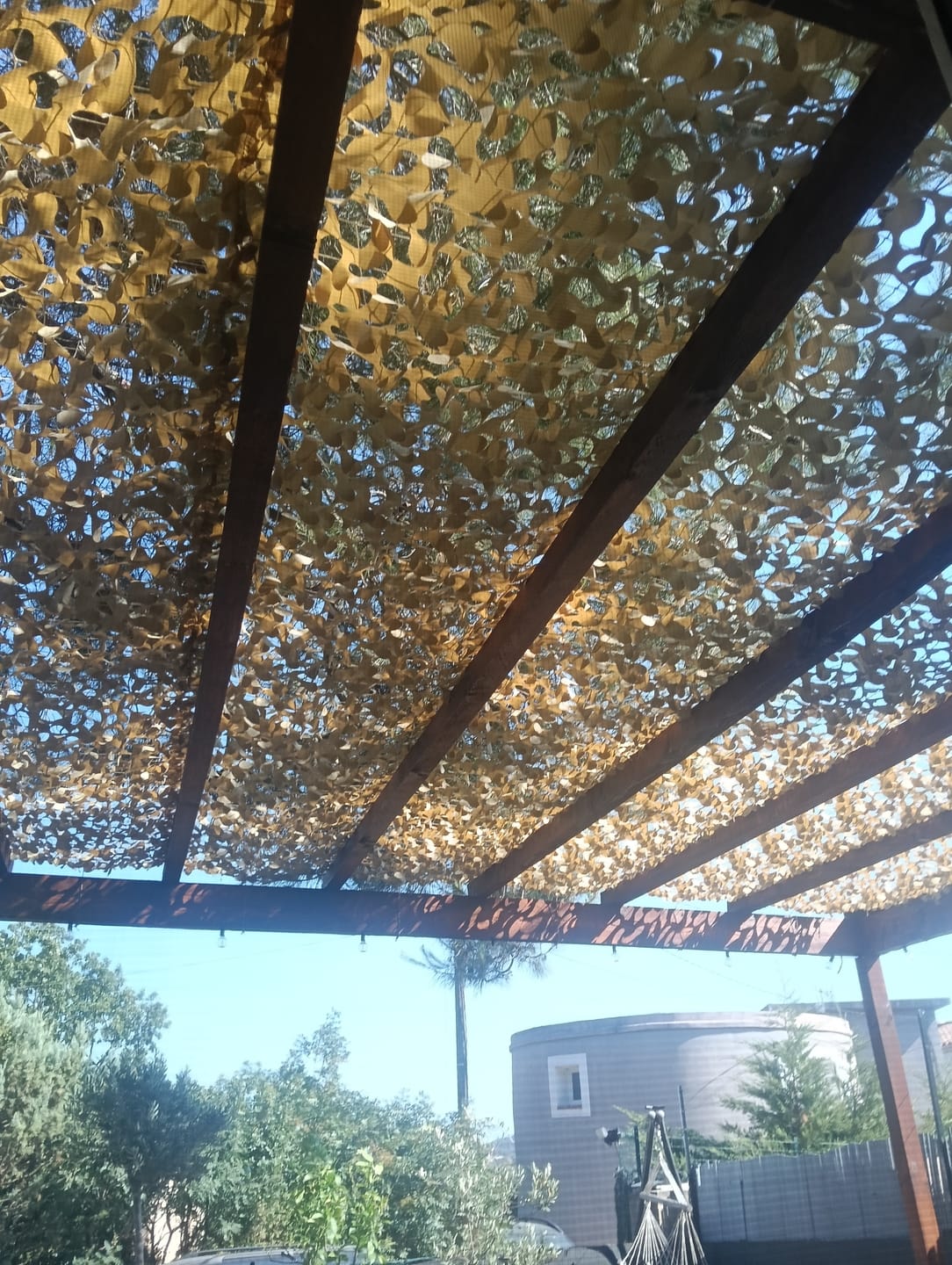 Customer photo review of Voile d'ombrage camouflage renforcée à câble acier