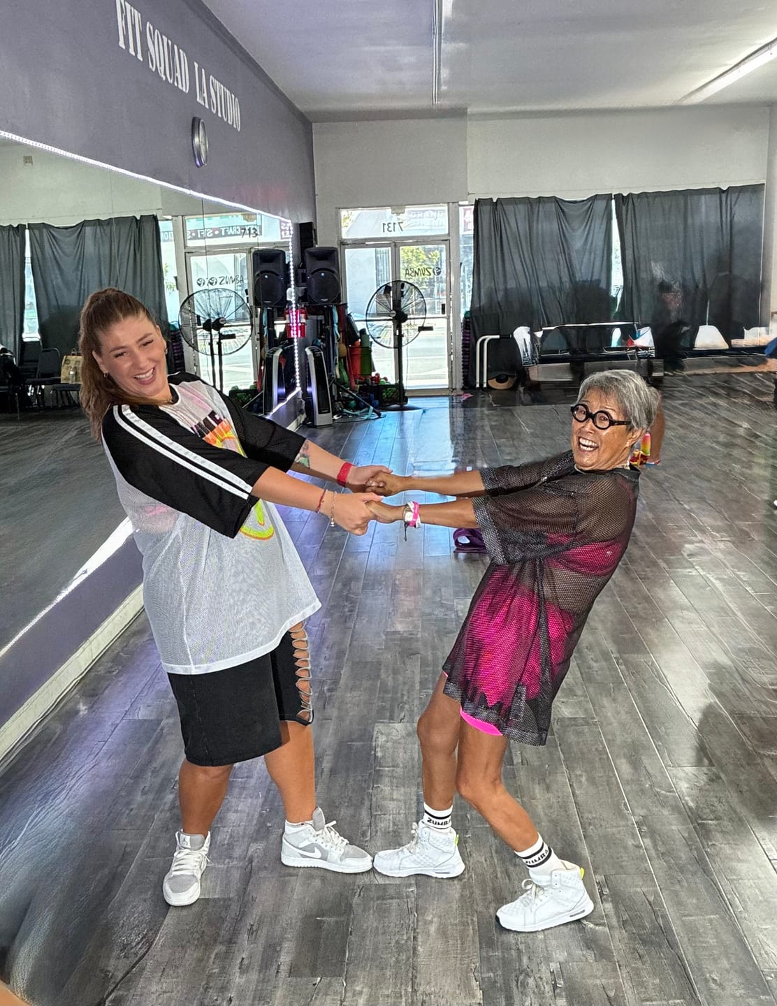 Customer photo review of Zumba Basic Oversized Mesh V-Neck Top - Black