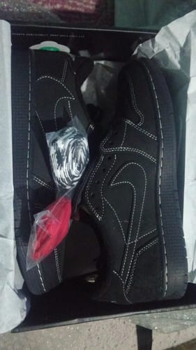 Customer photo review of Travis Scott x Air Jordan 1 Retro Low Black Phantom