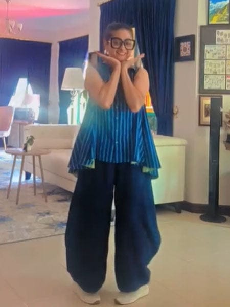Customer photo review of Cove Sleeveless Asymmetrical Top