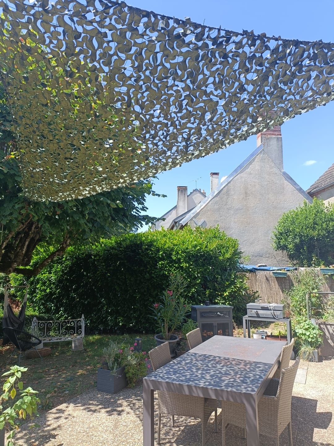 Customer photo review of Voile d'ombrage camouflage triangulaire vert
