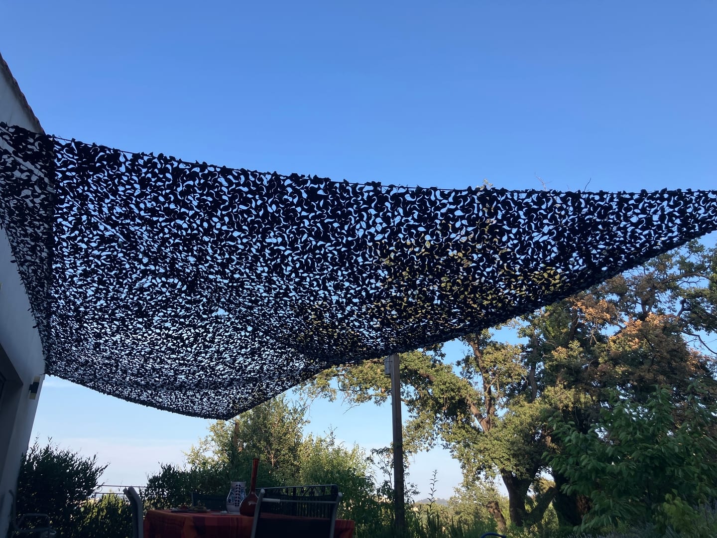 Customer photo review of Voile d'ombrage camouflage triangulaire noir