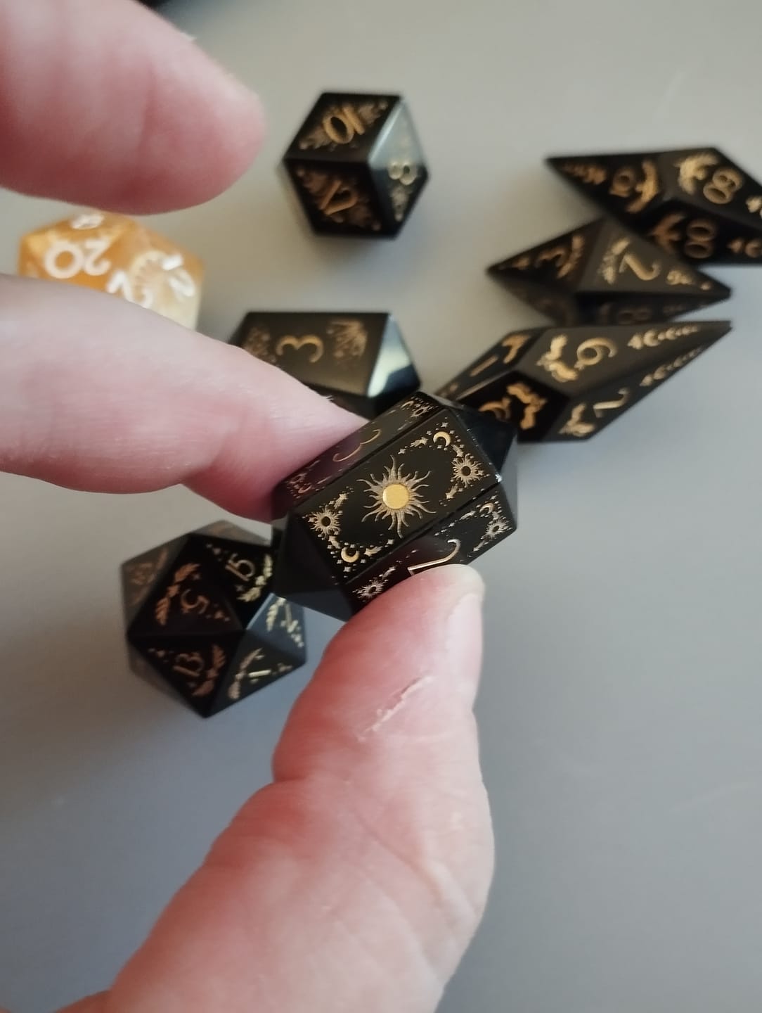 Customer photo review of URWizards D&D Obsidian Dice Set Crystal Shape Tarot Style