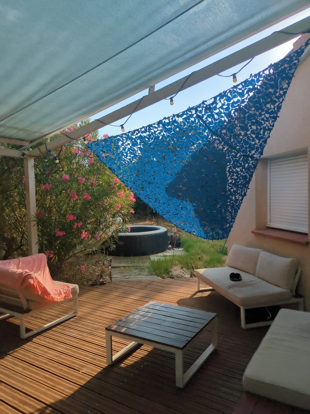 Customer photo review of Voile d'ombrage camouflage triangulaire bleu
