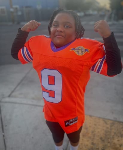 Customer photo review of Custom Orange Mesh Authentic Football Jersey with Royal and White Lettering Design 0140