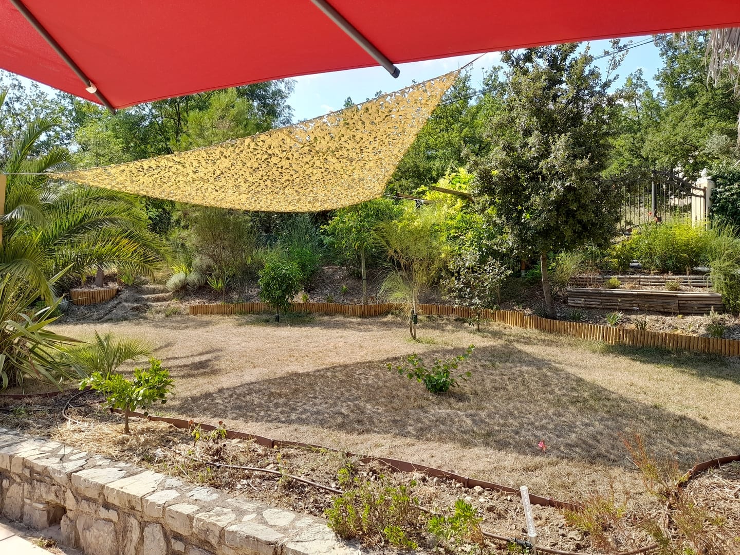 Customer photo review of Voile d'ombrage camouflage triangulaire sable