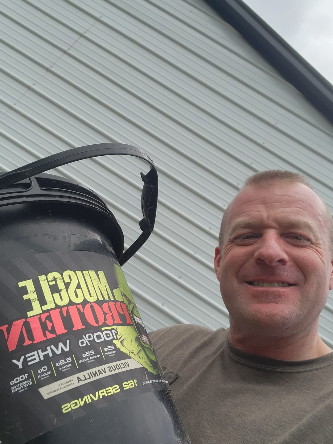 Customer photo review of 100% Whey Protein Powder