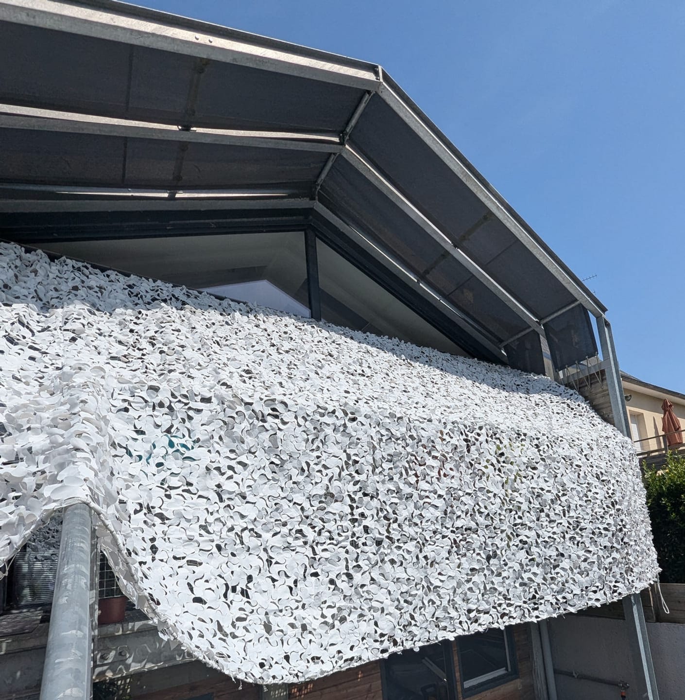 Customer photo review of Voile d'ombrage camouflage blanc