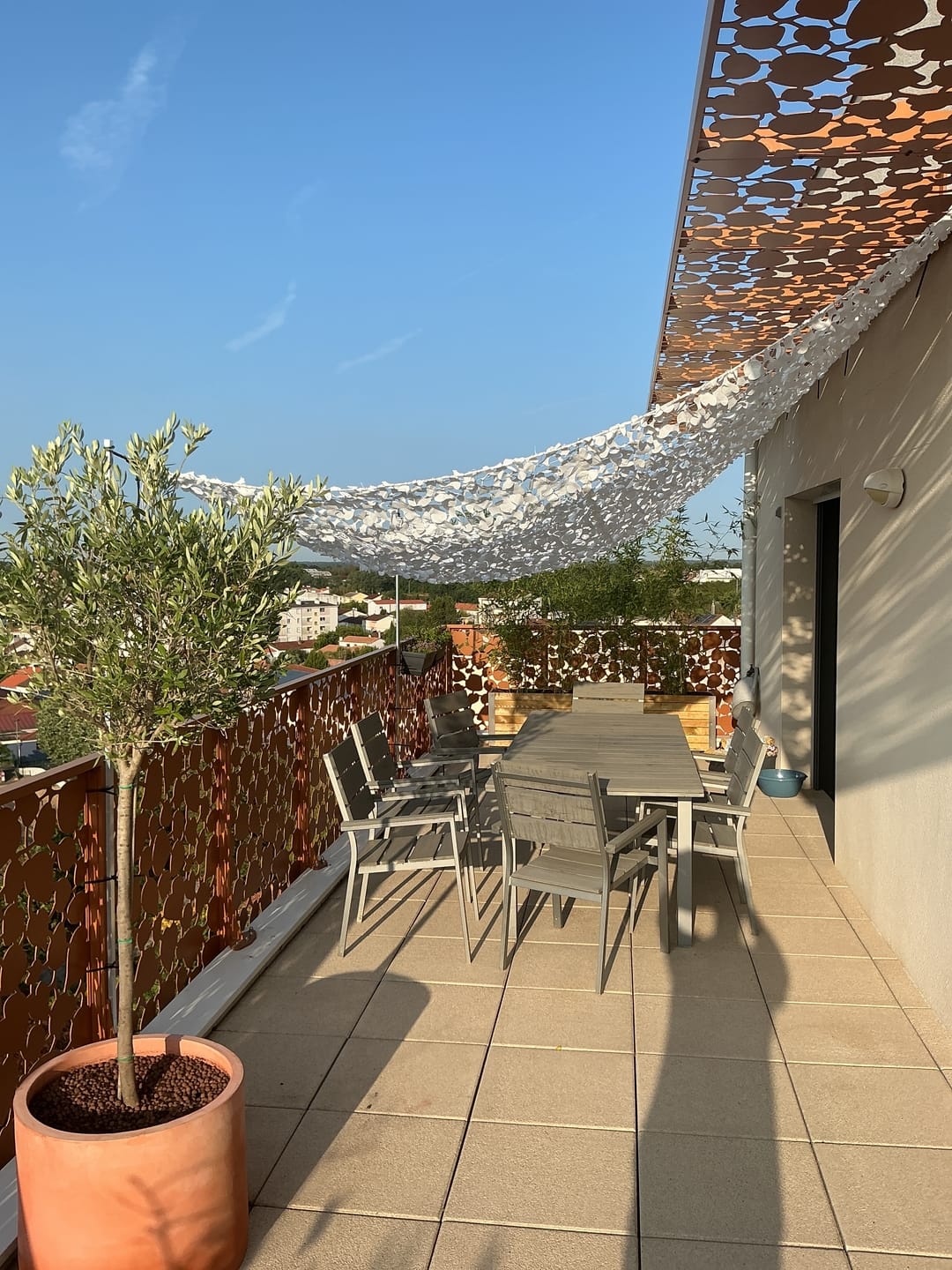 Customer photo review of Voile d'ombrage camouflage blanc