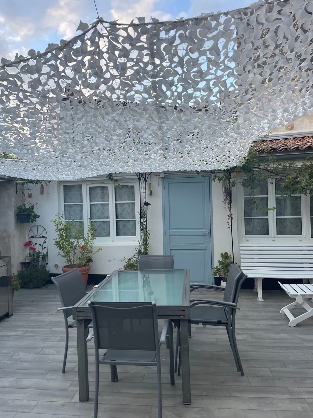 Customer photo review of Voile d'ombrage camouflage blanc