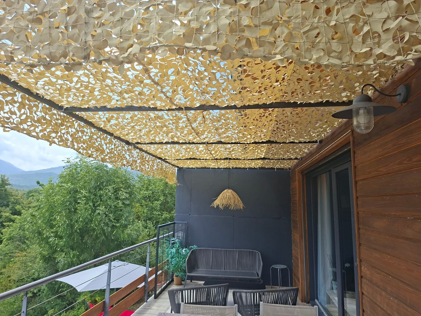 Customer photo review of Voile d'ombrage camouflage renforcée à câble acier