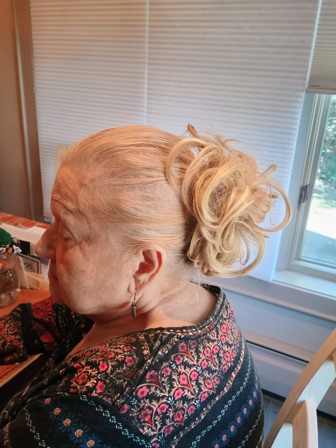 Customer photo: Sara K. wearing the JuvaBun Messy Bun [Free Today]