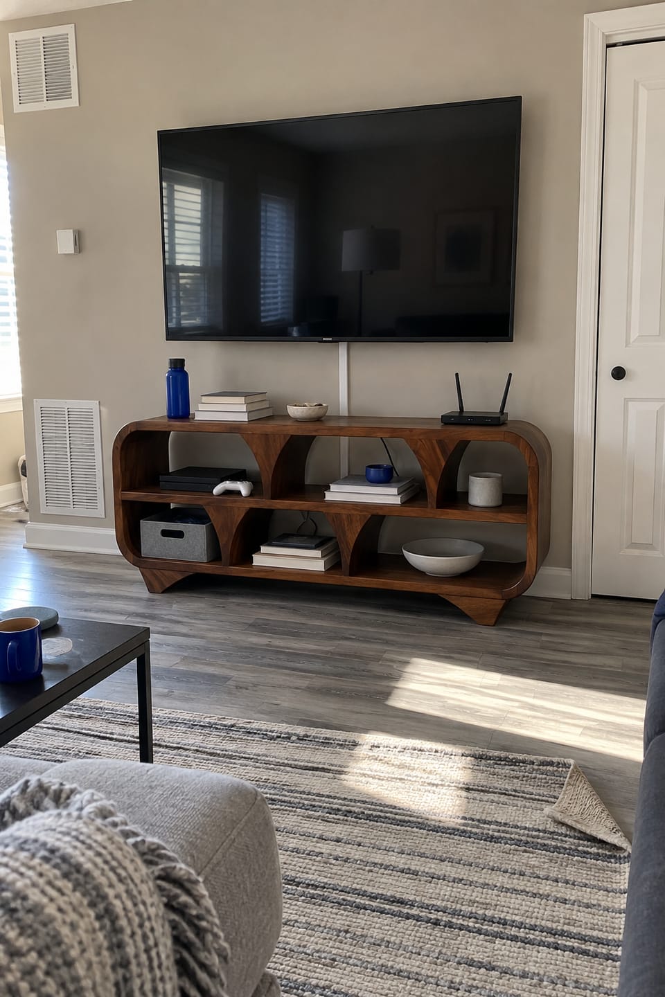 Customer photo review of Sculptural Solid Wood TV Stand with Open Shelf Storage Console Design
