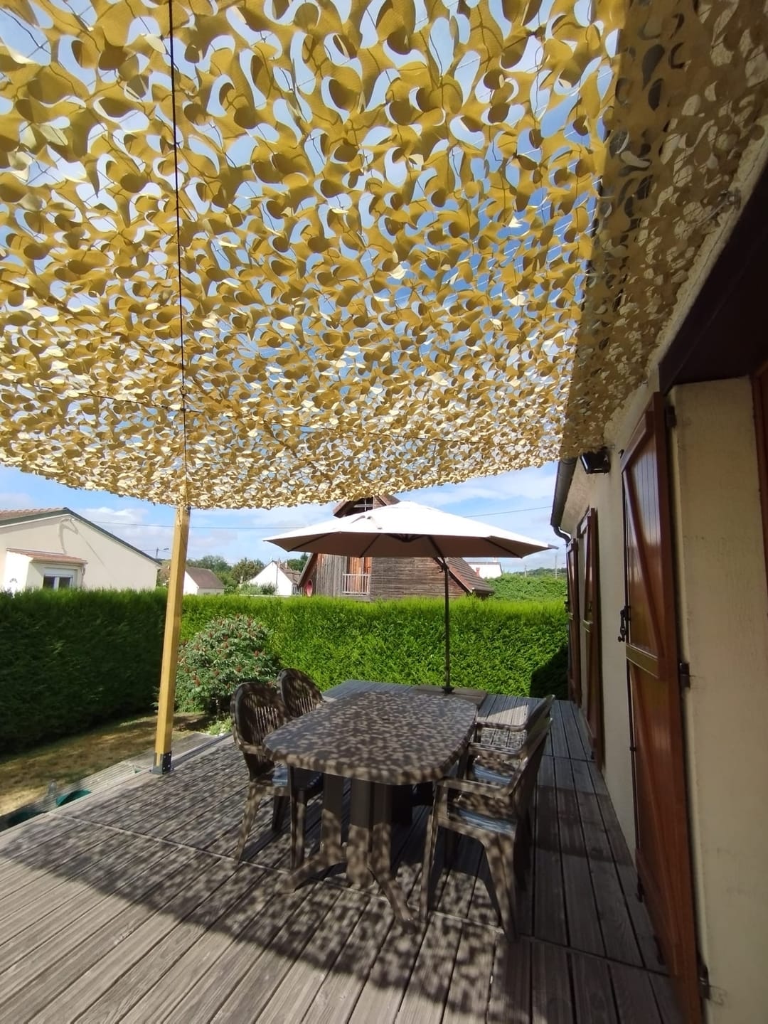 Customer photo review of Voile d'ombrage camouflage renforcée à câble acier
