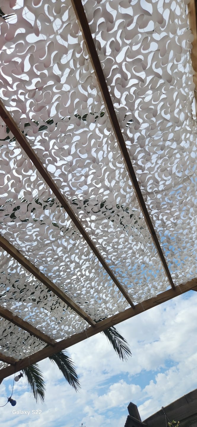 Customer photo review of Voile d'ombrage camouflage blanc