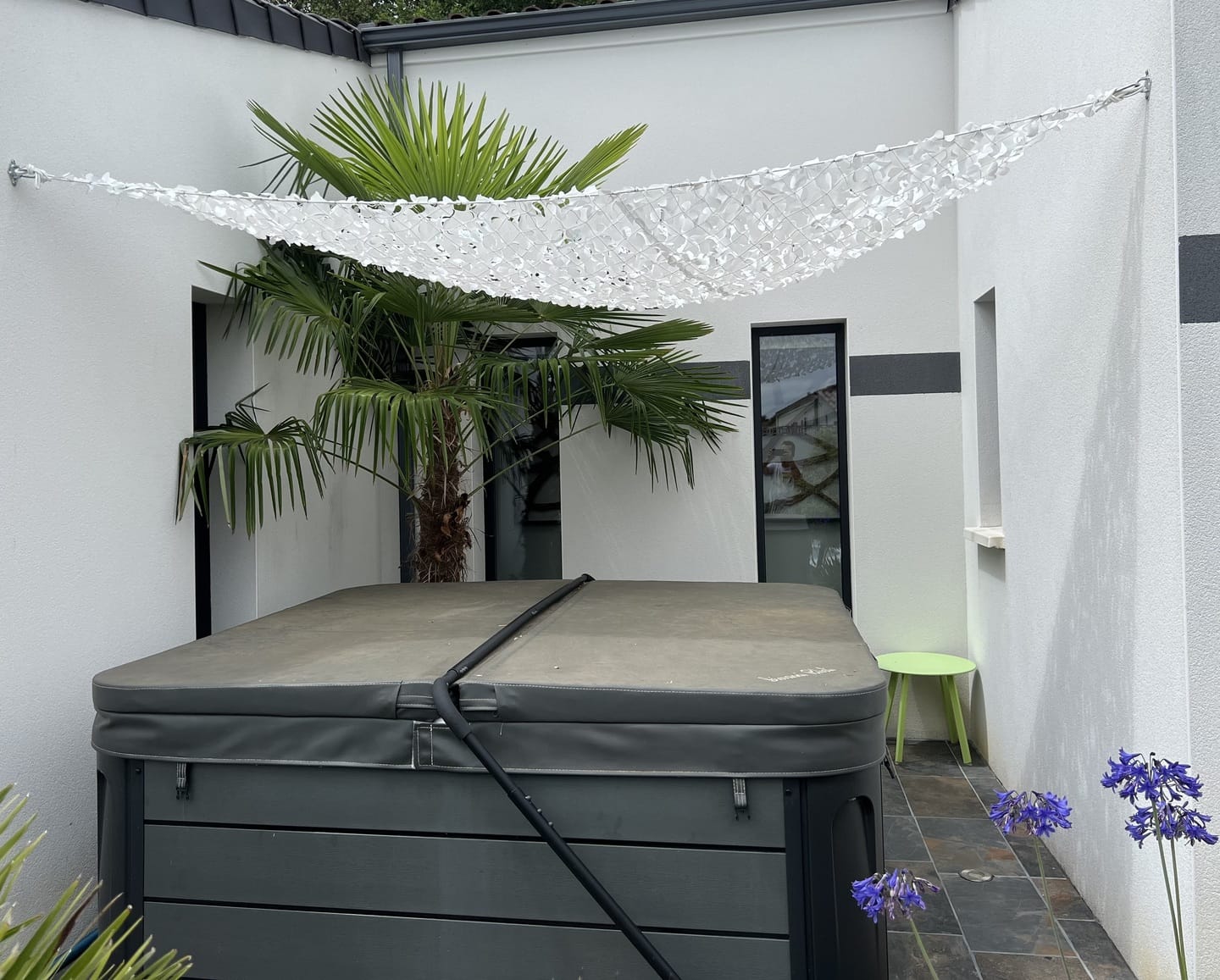 Customer photo review of Voile d'ombrage camouflage triangulaire blanc
