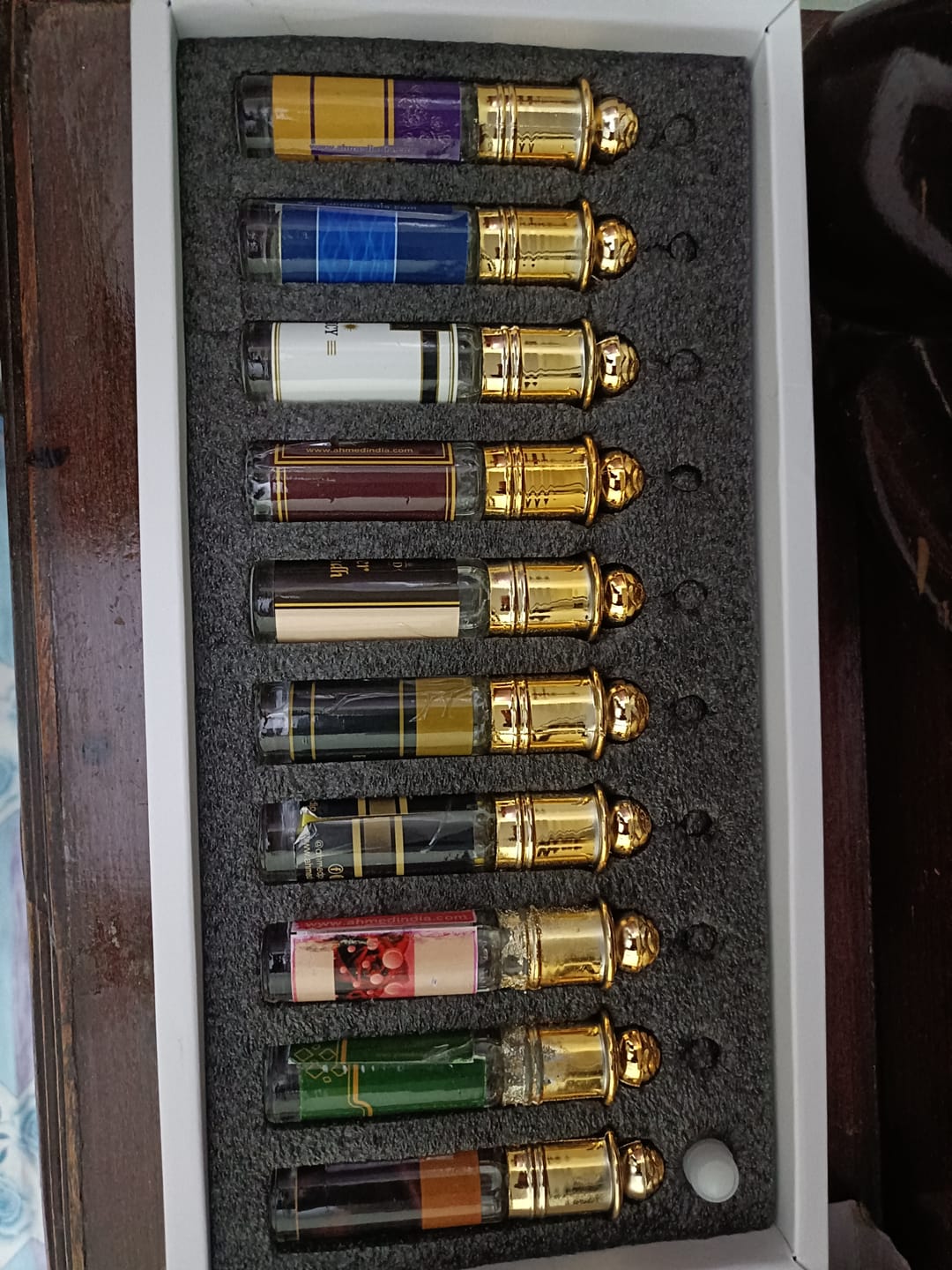 Customer photo review of Al Ahmed 10 PCS Aura Attar Collection | 6ml Each | Alcohol-Free Concentrated Perfume Oil | Long-Lasting Unisex Attar Gift Set for Men & Women | Premium Fragrance Combo