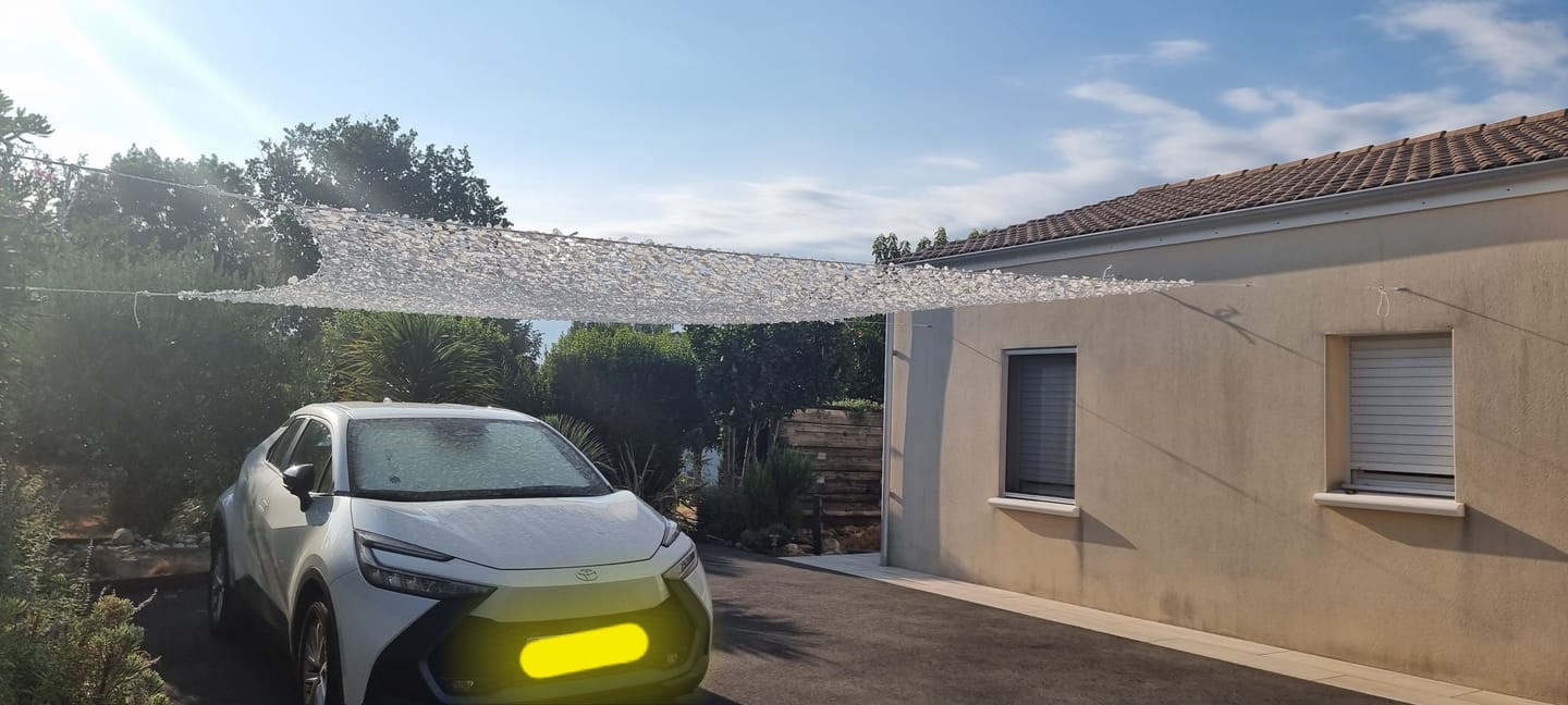 Customer photo review of Voile d'ombrage camouflage blanc