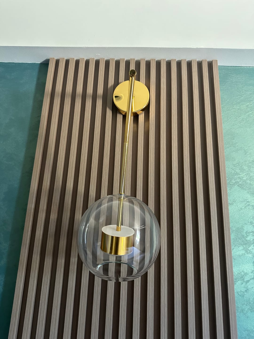 Customer photo review of Minimalist Sphere Wall Hanging Light Transparent Glass Bedside LED Wall Lamp in Gold