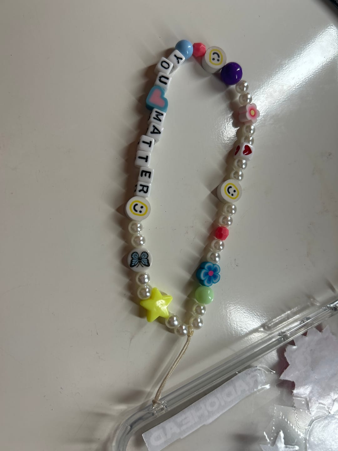 Customer photo review of You Matter Phone Charm