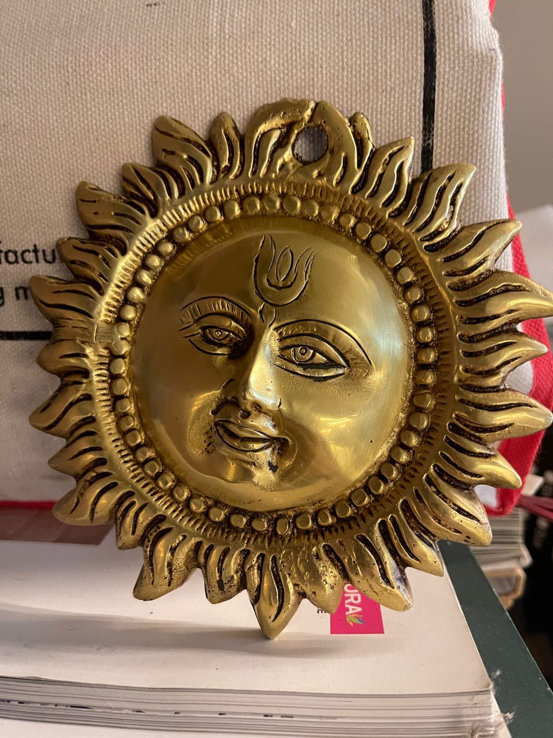 Customer photo review of Brass Vastu Sun Wall Hanging Idol Vastu Remedy for East Direction Balance, Fame and Positive Energy for Home, Office and Entrance Decor | 15 x 15 cm | 800 g