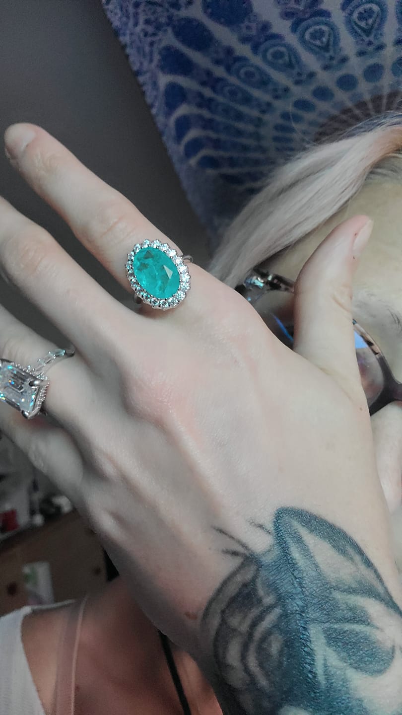 Customer photo review of Halo Oval Cut Paraiba Tourmaline Sterling Silver Ring