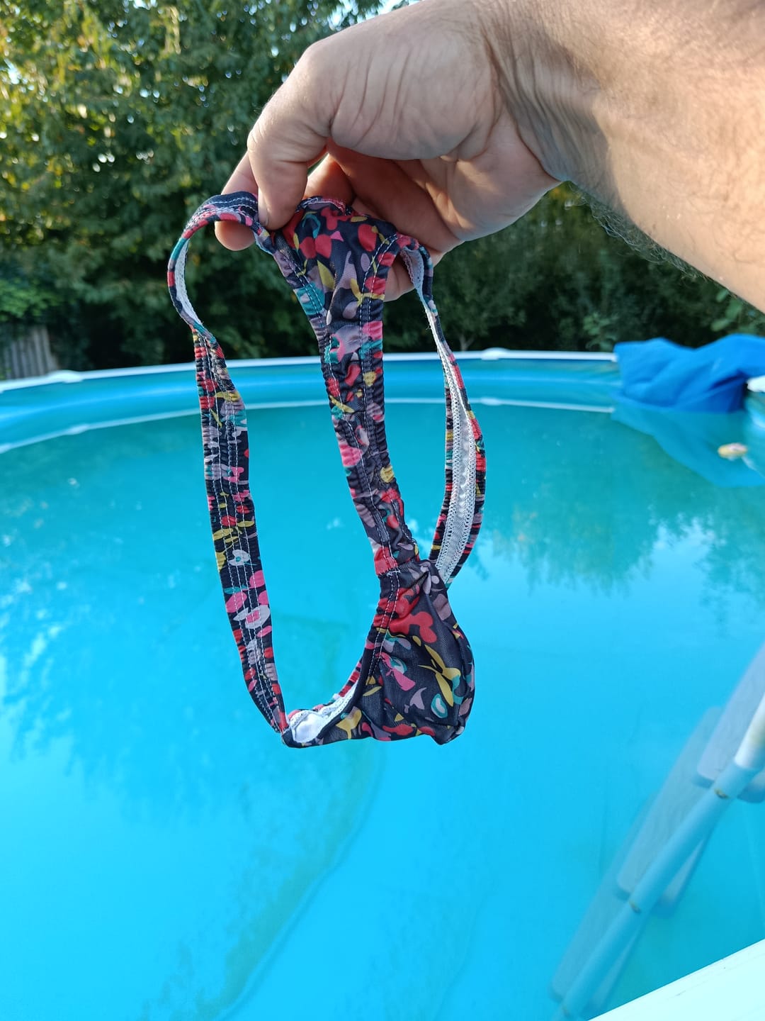 Customer photo review of 4 Pack Men's Ultra Thin High Elastic Quick Dry 3D Pouch Swim Thongs