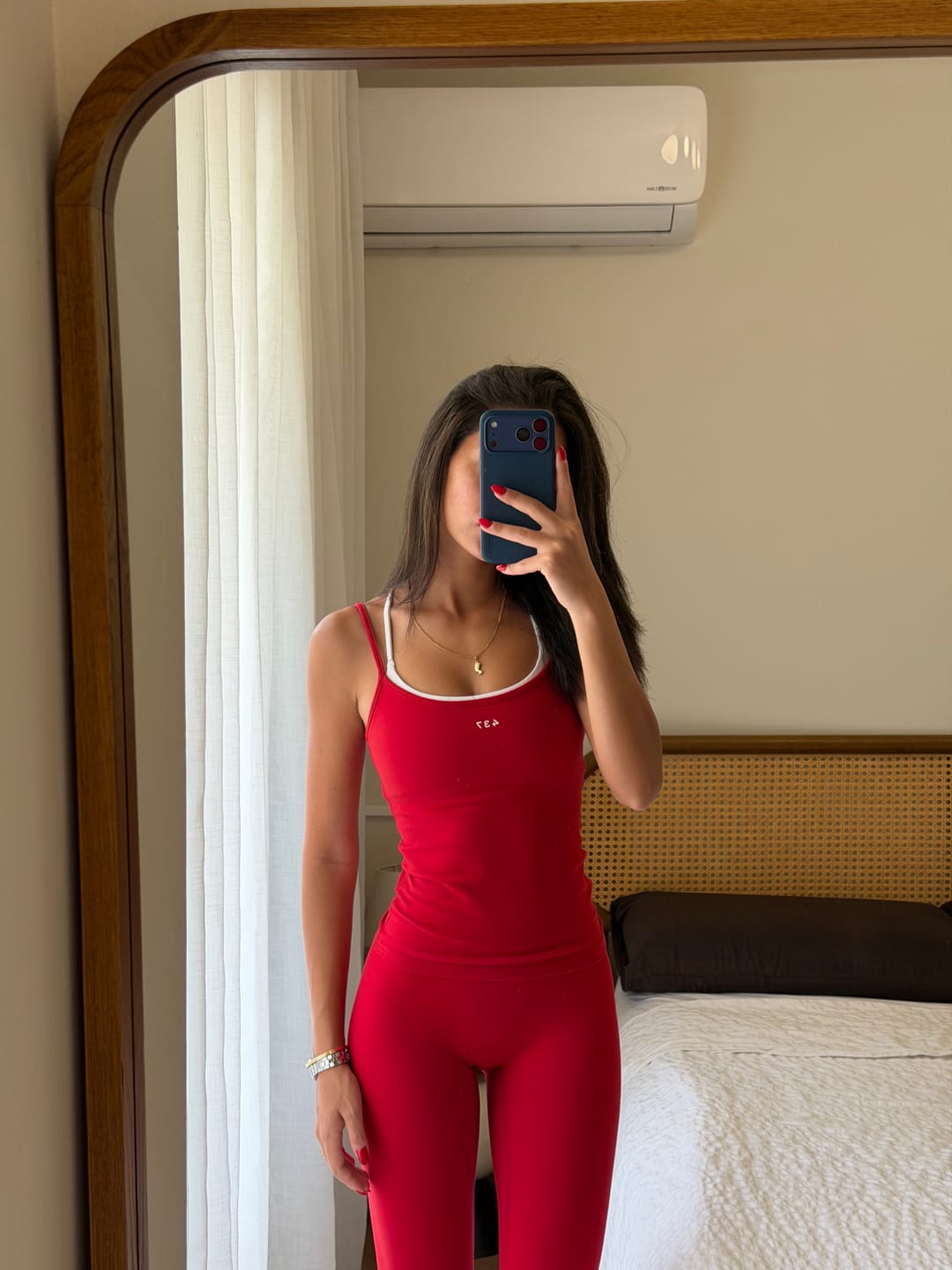 Customer photo review of The Minimalist Tank Scarlet
