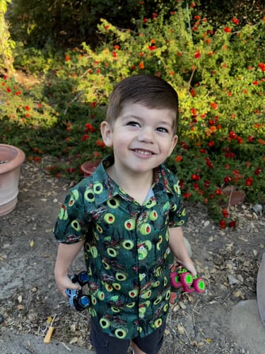 Customer photo review of Zombie vs Hunter Button Up Shirt (Kids & Adults)